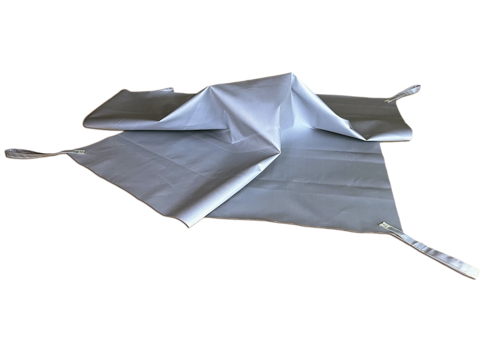 Couverture anti-feu pour recouvrir des petits appareils portatifs