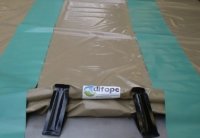 Bac de rétention souple en PVC 1000g/m². Parois autoportantes avec plaques de renfort intégrées